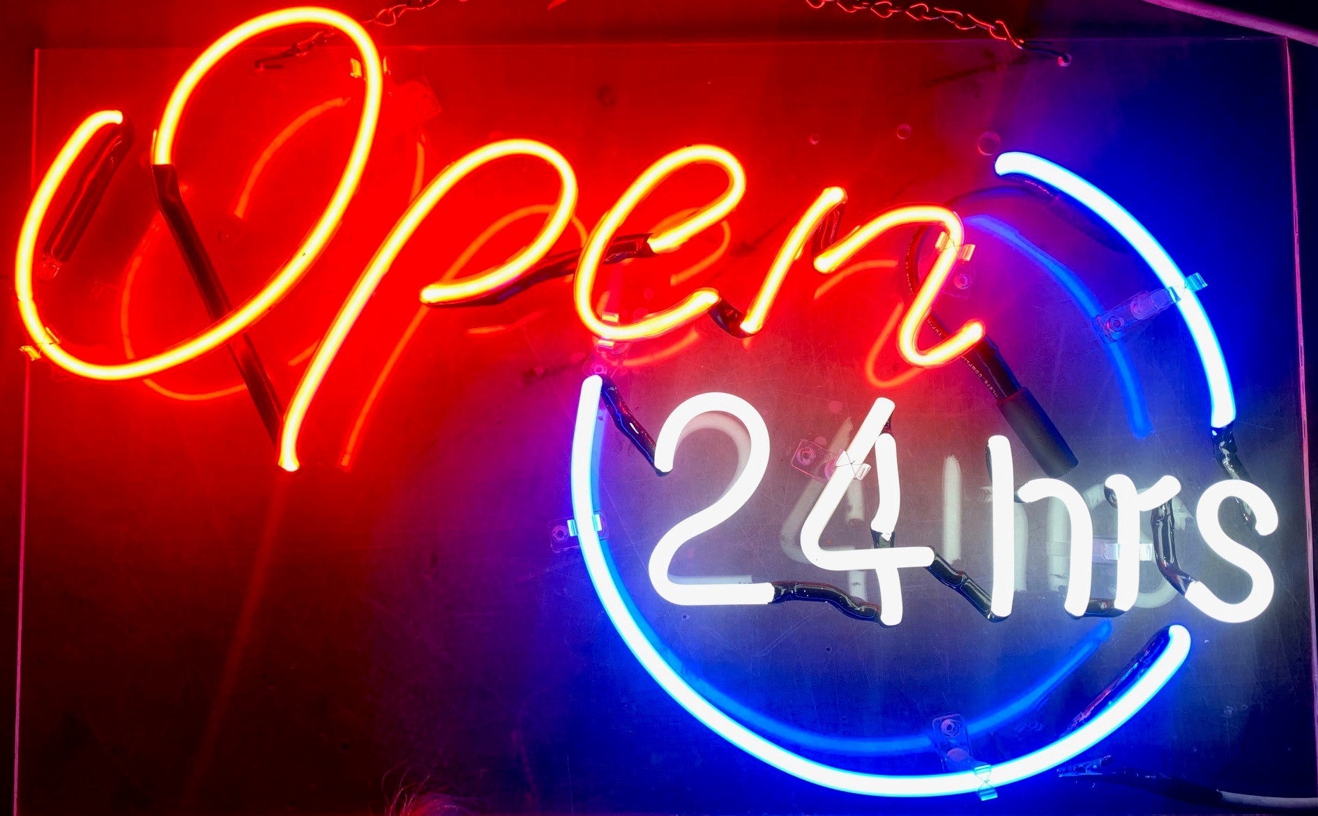 OPEN 24 HRS neon sign